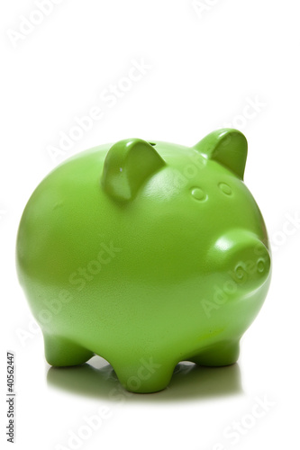 Piggy bank or money box isolated on a white studio background.