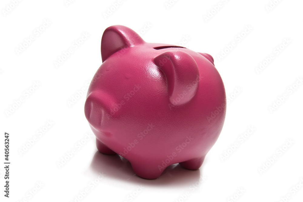 Piggy bank or money box isolated on a white studio background.