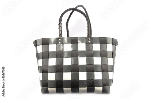 Plastic bag with black and white stripes isolated on white