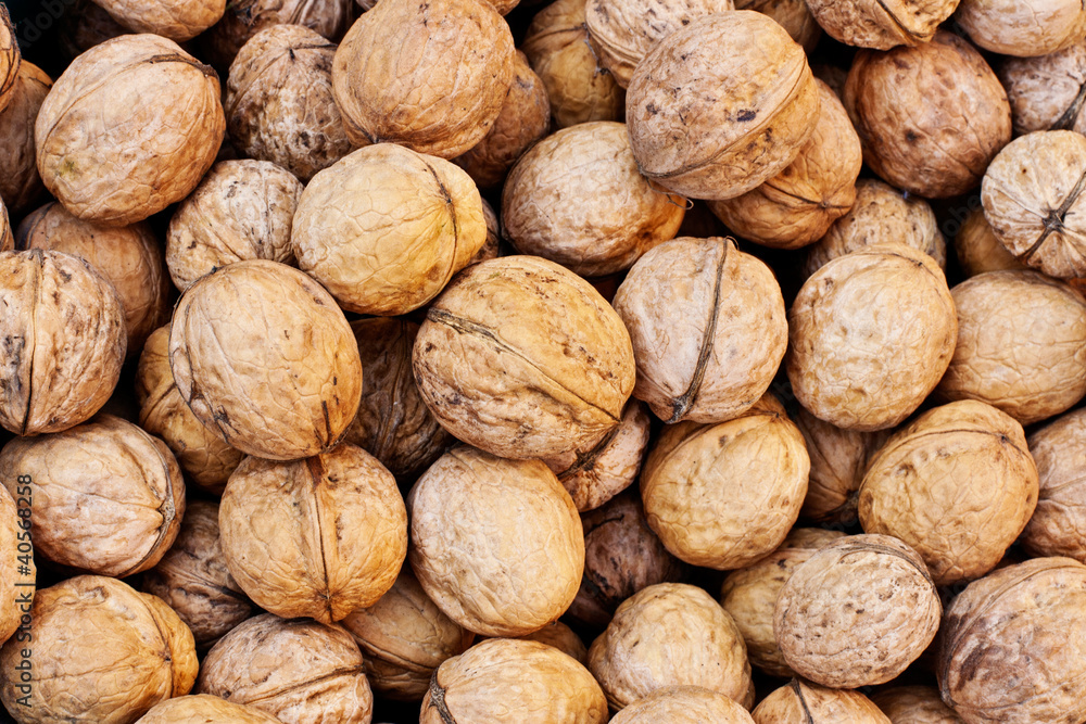 closeup of a walnuts stack texture closeup of a walnuts stack texture
