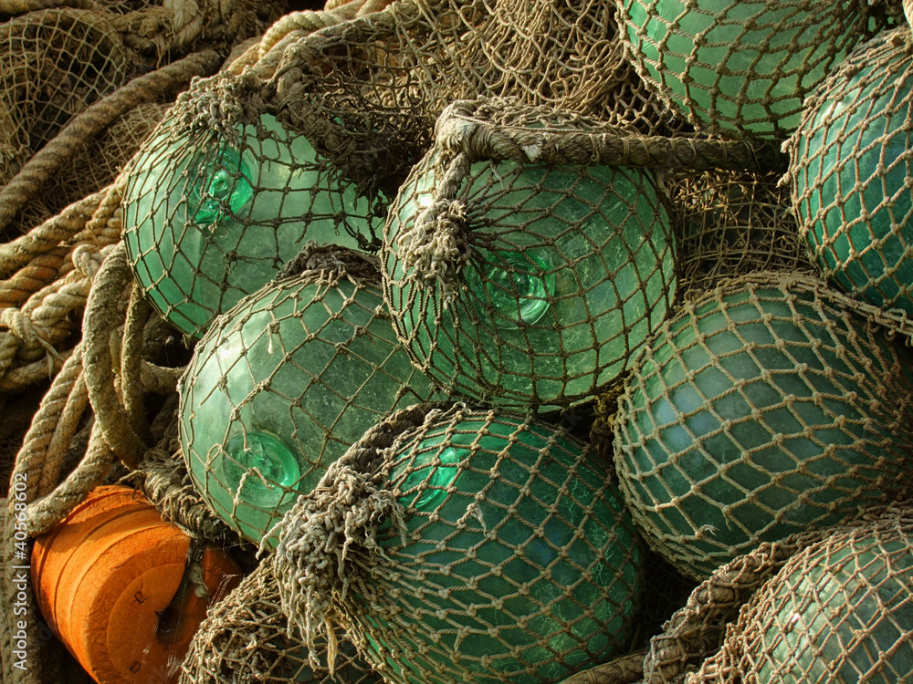 glass float, old fishing nets Stock Photo