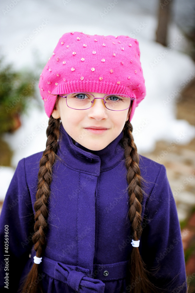 Portrait of child girl with pigtail in pink barret Portrait of child girl with pigtail in pink barret