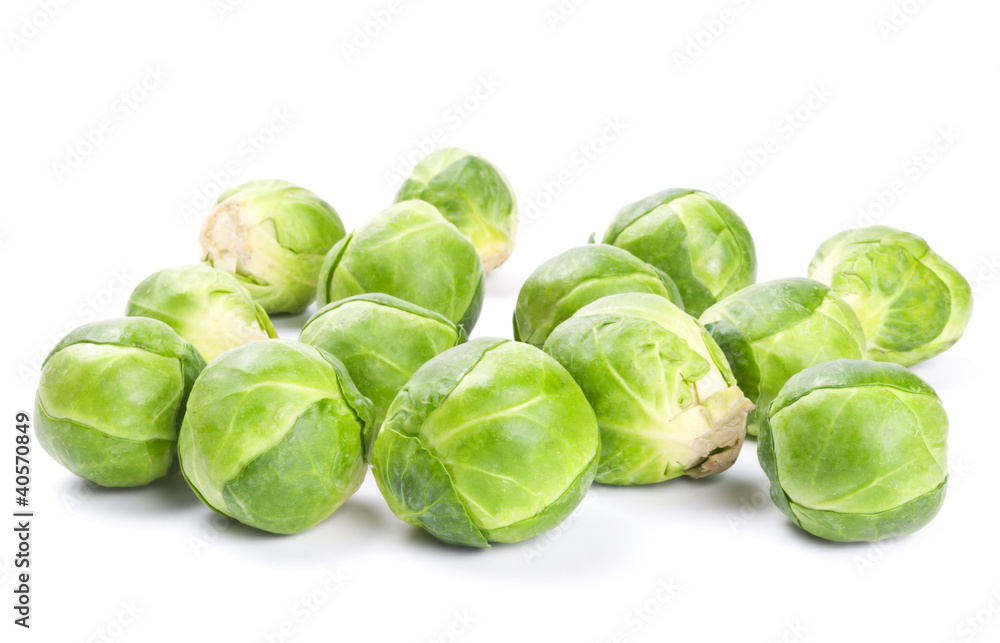 Fresh green Brussels sprouts isolated on white Fresh green Brussels sprouts isolated on white