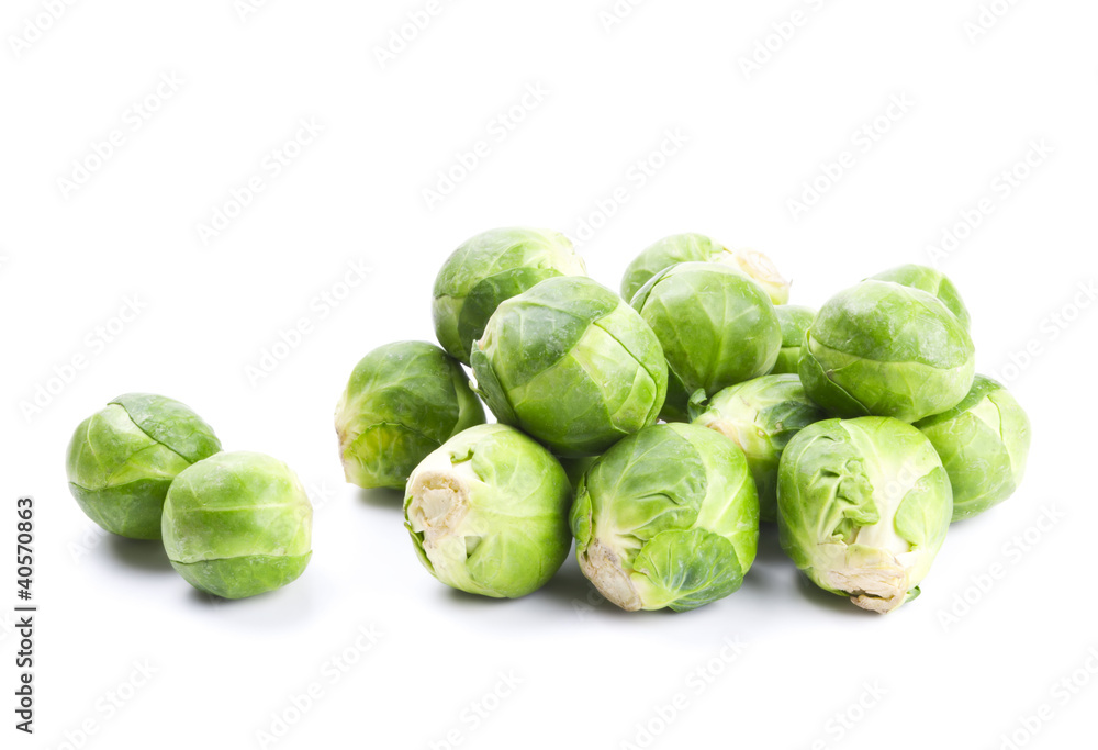 Fresh green Brussels sprouts isolated on white Fresh green Brussels sprouts isolated on white