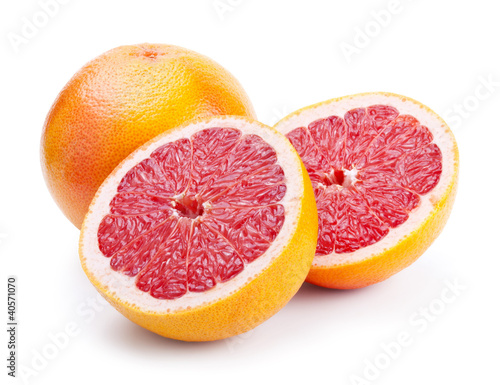 grapefruit with slices isolated on white