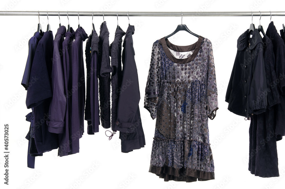 Designer fashion clothing on hangers at the show Designer fashion clothing on hangers at the show