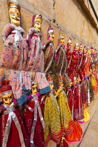 Rows of colorful puppets for sale in Jasalmer
