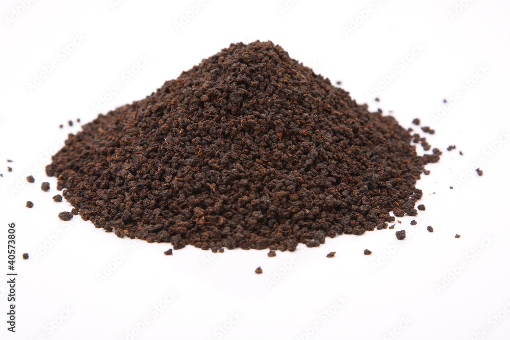 Image of granulated black tea isolated on white Image of granulated black tea isolated on white
