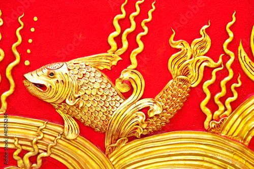 The gold stucco design of native thai style on the Wall © yuri2011