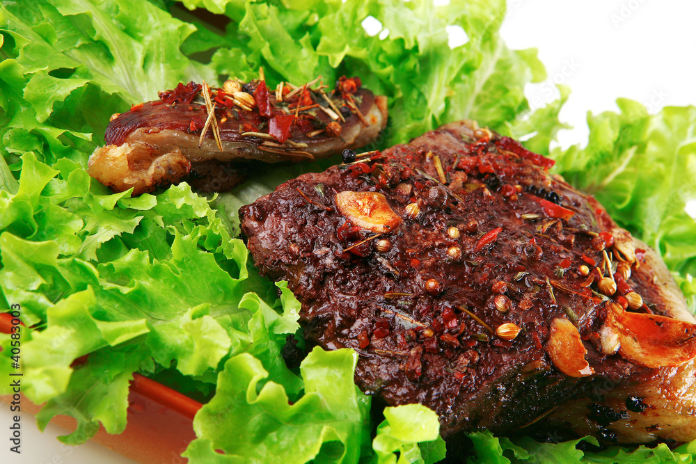 served beef meat on salad