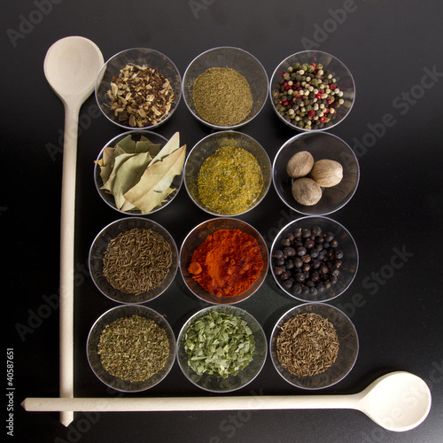 spices with wooden spoons