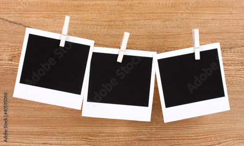 Wallpaper Mural Photo papers hanging on the clothesline on wooden background Torontodigital.ca