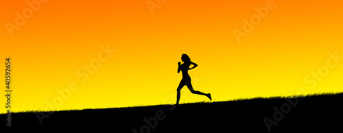silhouette of a beautiful young women jogging