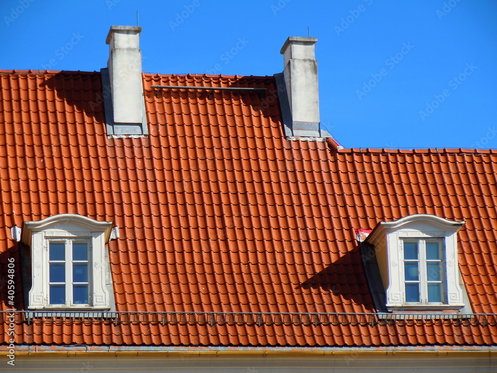 Red roof, white dormers and chimneys (Riga, Latvia) Red roof, white dormers and chimneys (Riga, Latvia)