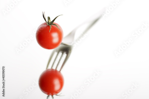 Tomate auf Gabel unscharf