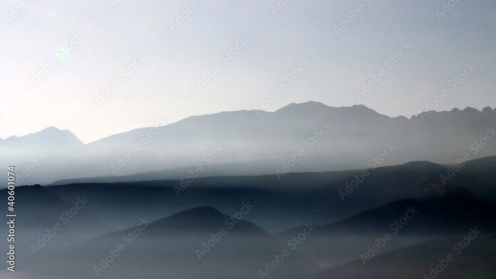 Passage over foggy in the morning mountains, Poland Passage over foggy in the morning mountains, Poland