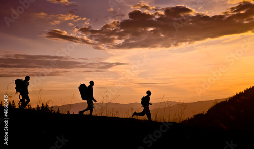 hikers on sunset