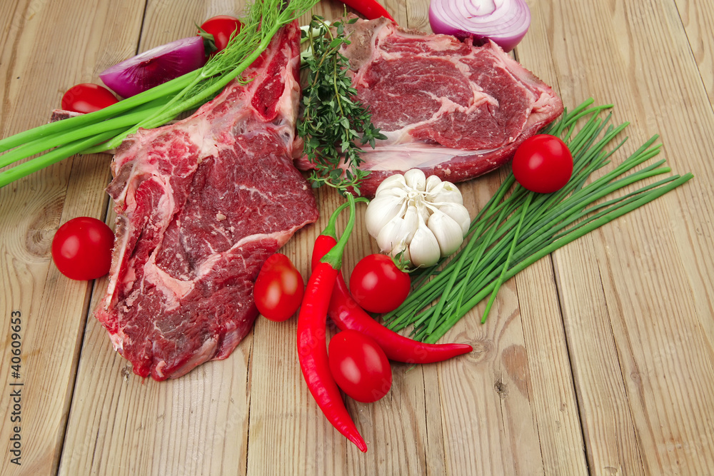 fresh lamb ribs served with thyme , red chili pepper fresh lamb ribs served with thyme , red chili pepper