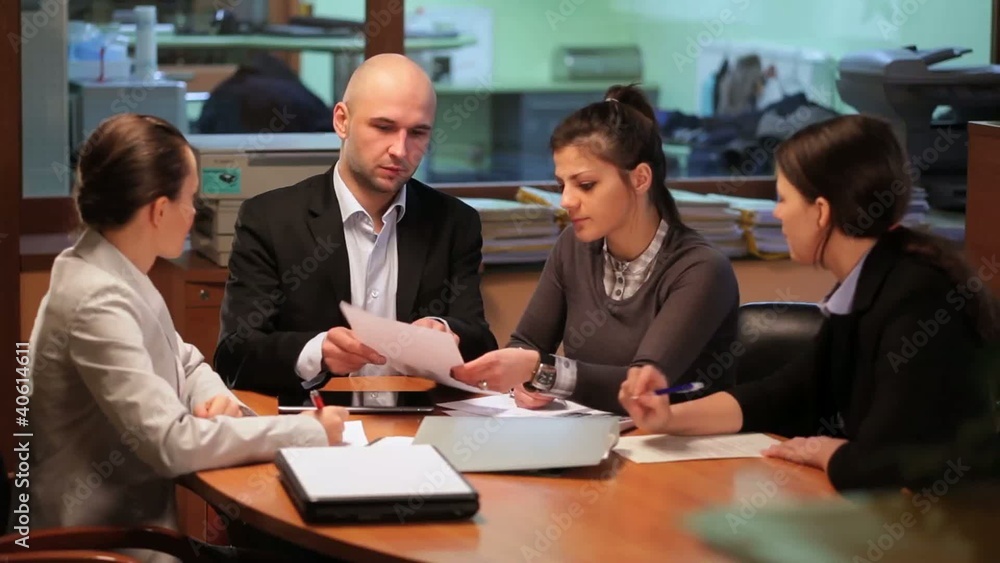 Team work in the office with tablet Team work in the office with tablet