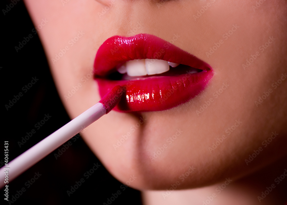 Naklejka premium Beautiful red gloss lips with brash