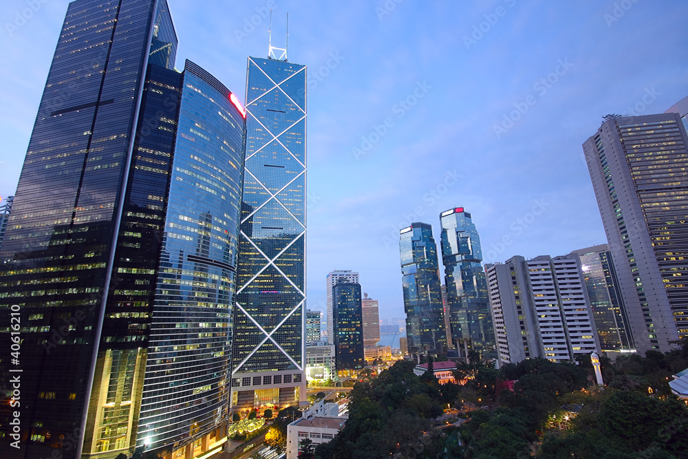 Obraz premium office building at night in hong kong