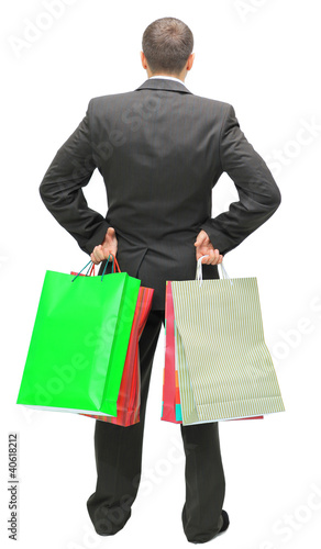 Happy shopping man. Isolated over white background