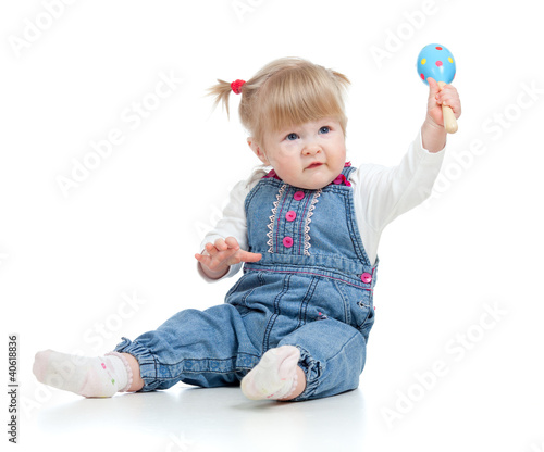 Baby  girl with musical toy...