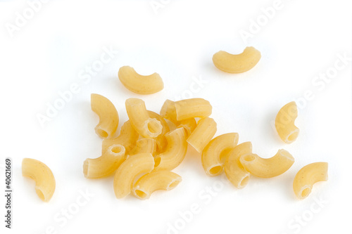 Closeup of a yellow macaroni on a white background