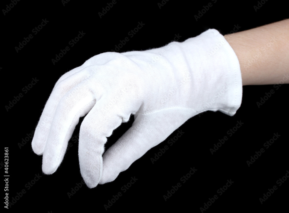 cloth glove on hand on black background. cloth glove on hand on black background.