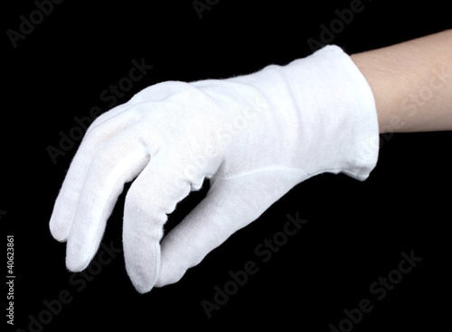 cloth glove on hand on black background.