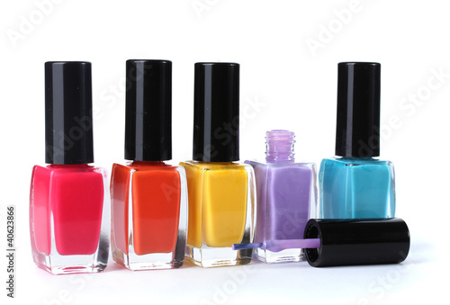 Group of bright nail polishes isolated on white