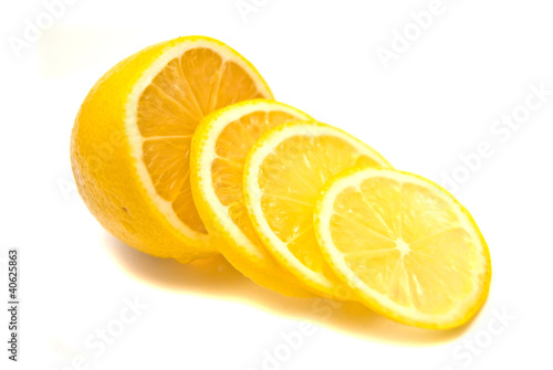 Lemon slices and fresh lemon