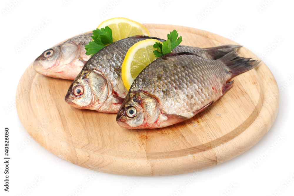 Fresh fishes with lemon and parsley