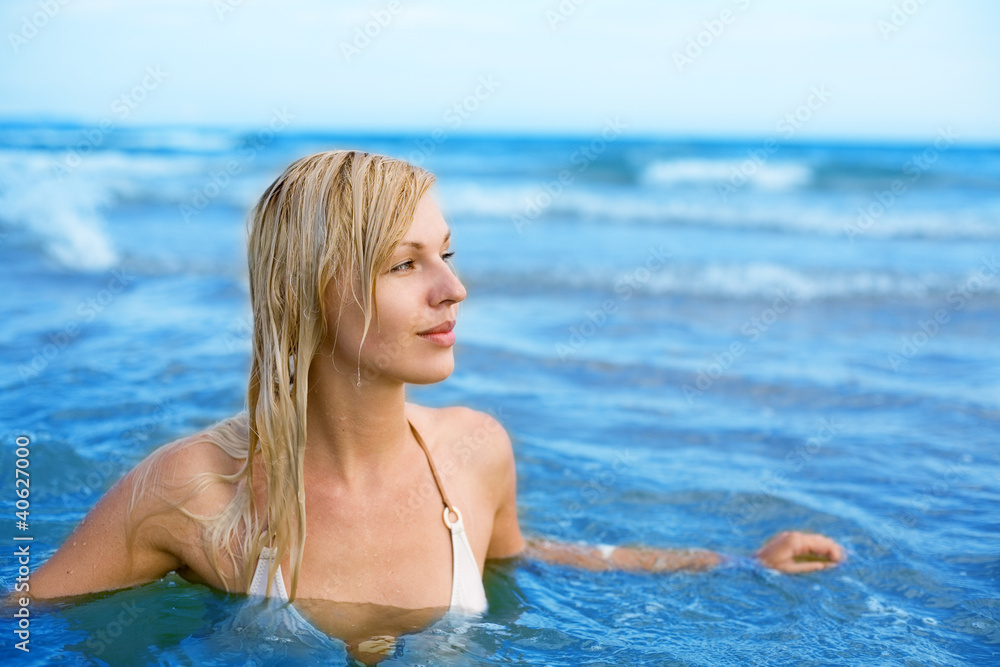 girl swims in sea