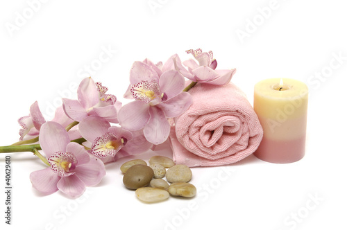 Spa concept with pink orchid  candle  towel  pebble