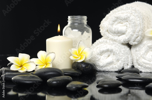 Spa Still life with frangipani flowers  candles and towels