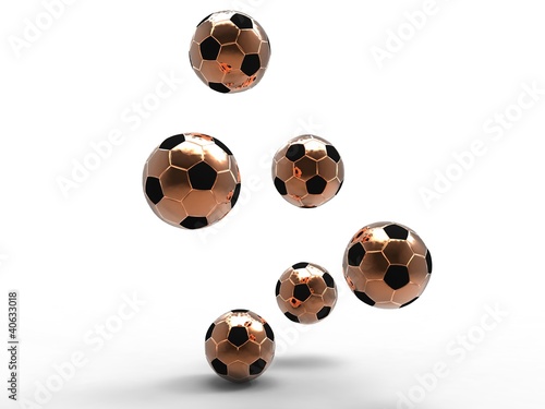 illustration of several gold footballs being bounced