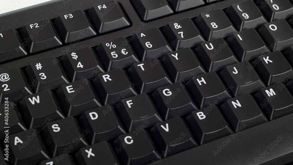 Part of black computer keyboard Part of black computer keyboard