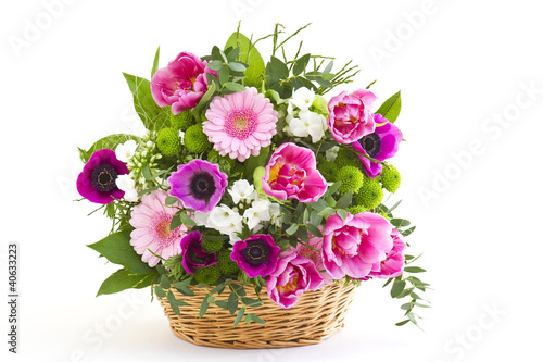 Fototapeta Naklejka Na Ścianę i Meble -  colorful flowers in a basket