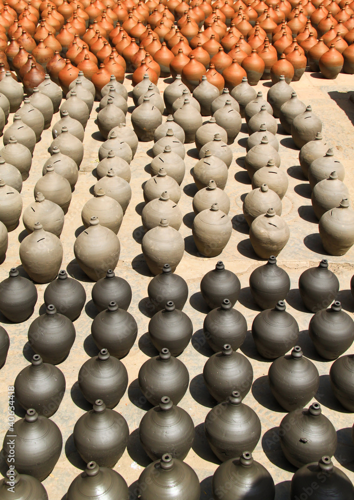 Many clay vases kept for drying Many clay vases kept for drying