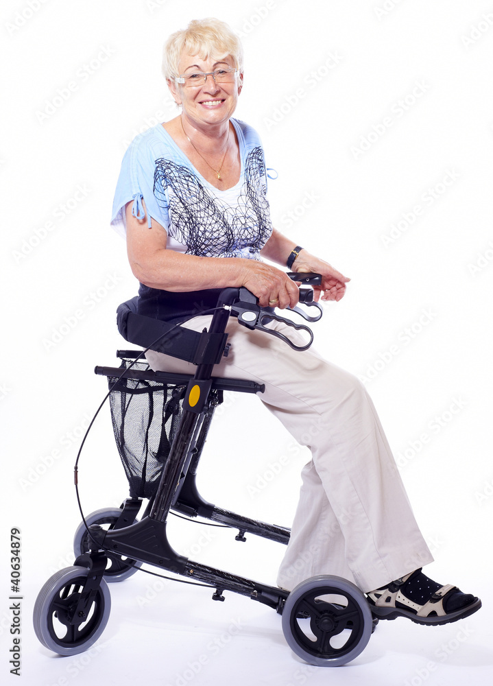 happy elderly lady sitting on a walker for disabled people Stock Photo |  Adobe Stock