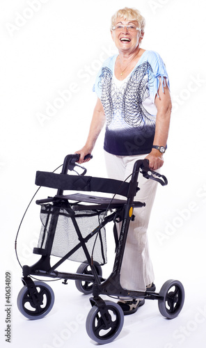 happy senior lady with walker for disabled people