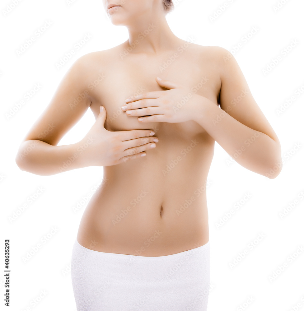 Fototapeta premium Woman examining her breast isolated on white background