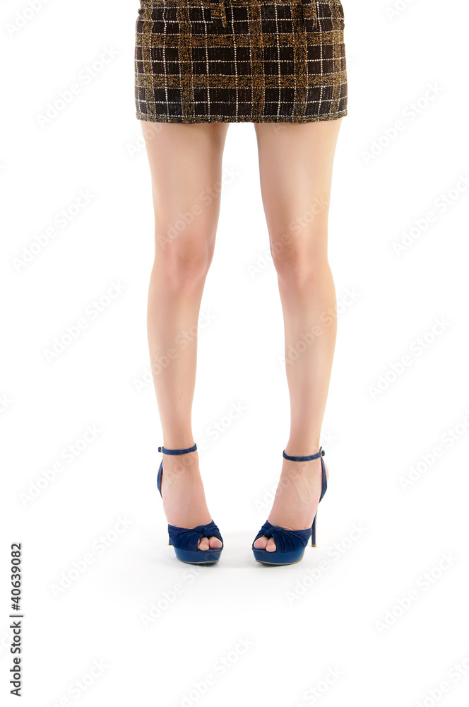 legs in blue shoes and brown skirt isolated legs in blue shoes and brown skirt isolated