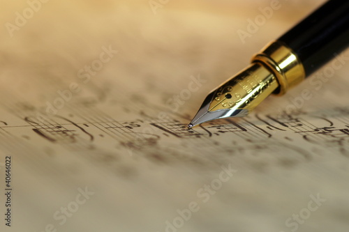 Sheet music and fountain pen