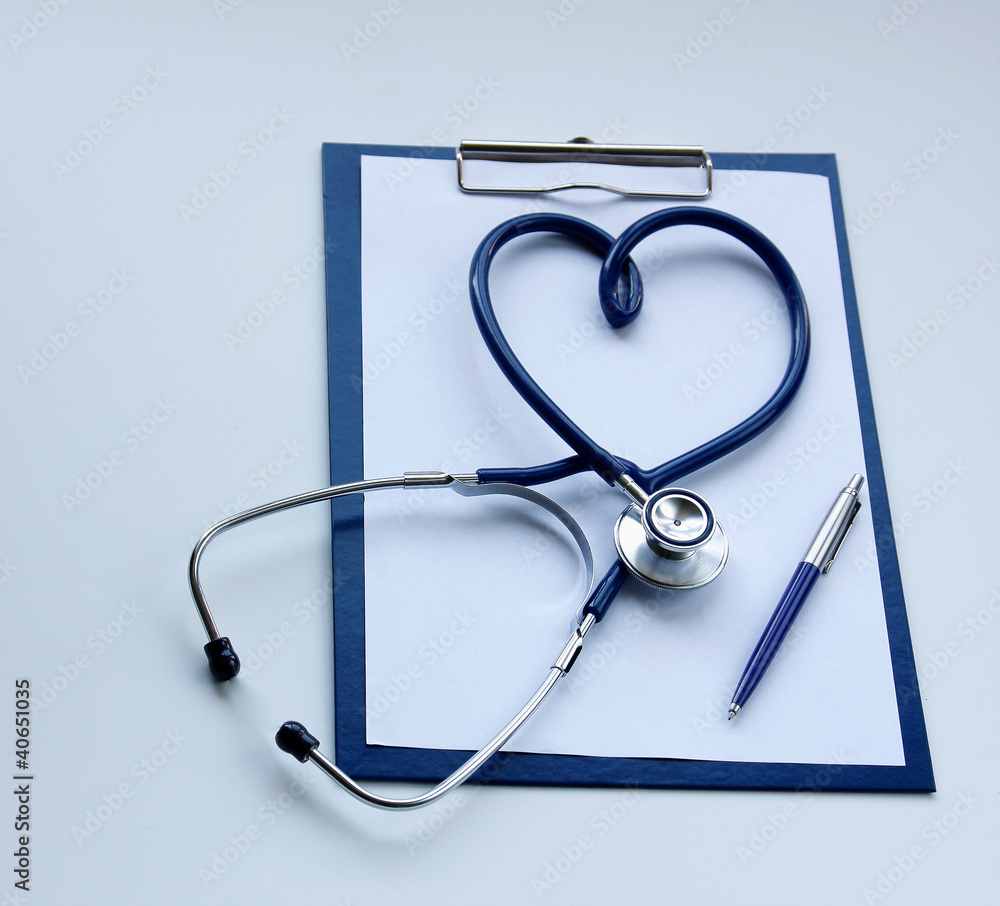 Blank clipboard with modern stethoscope Blank clipboard with modern stethoscope