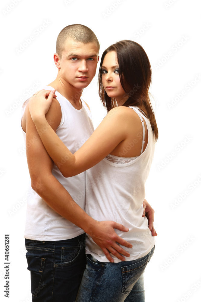 Casual young couple standing on white background Casual young couple standing on white background