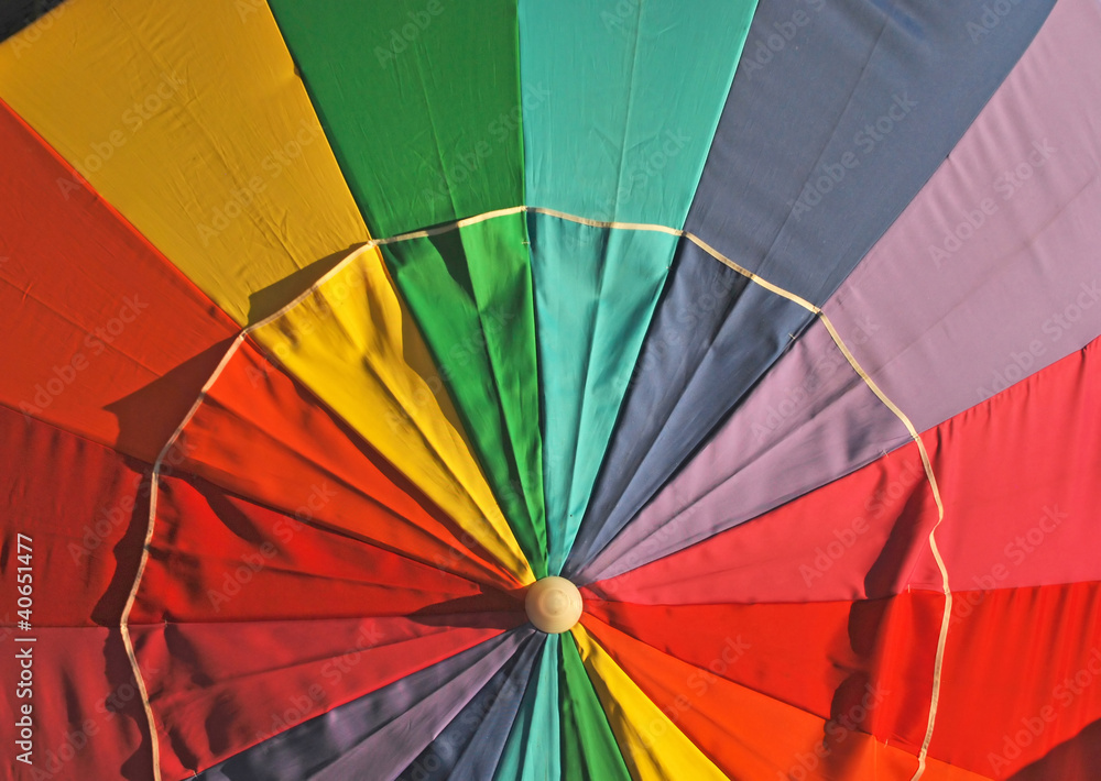 Fototapeta premium A close up of a colorful umbrella at Clearwater beach in Florida