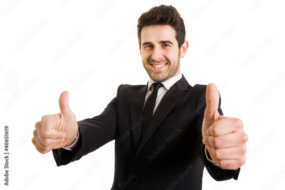 Successful young business man thumbs up on white background Successful young business man thumbs up on white background
