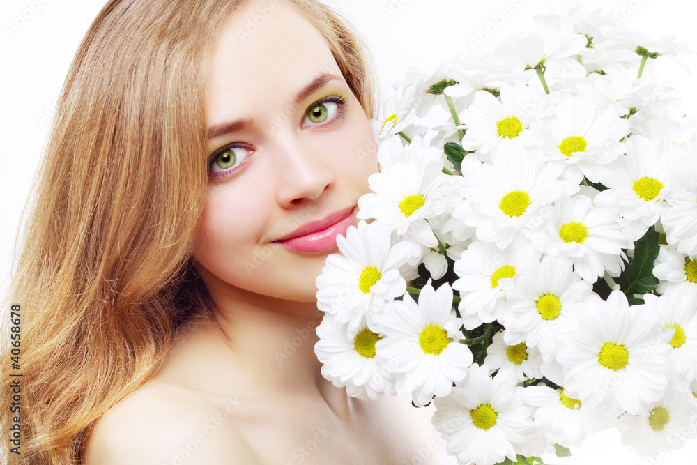 beautiful girl with white chrysanthemum on a light background beautiful girl with white chrysanthemum on a light background
